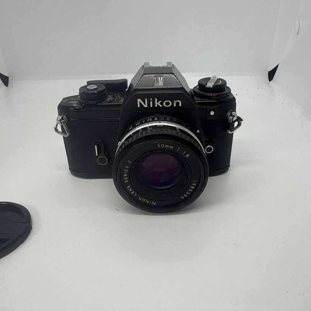 Vintage Nikon EM Black SLR Film Camera with Nikon Lens